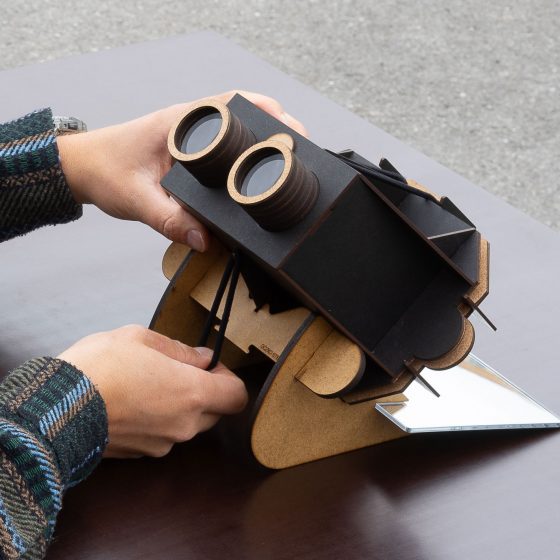 attaching a stereoscope to the base with mirror